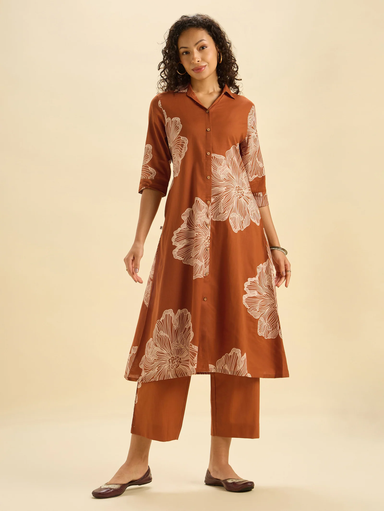 rust-orange-pure-cotton-printed-flared-kurti-set-1