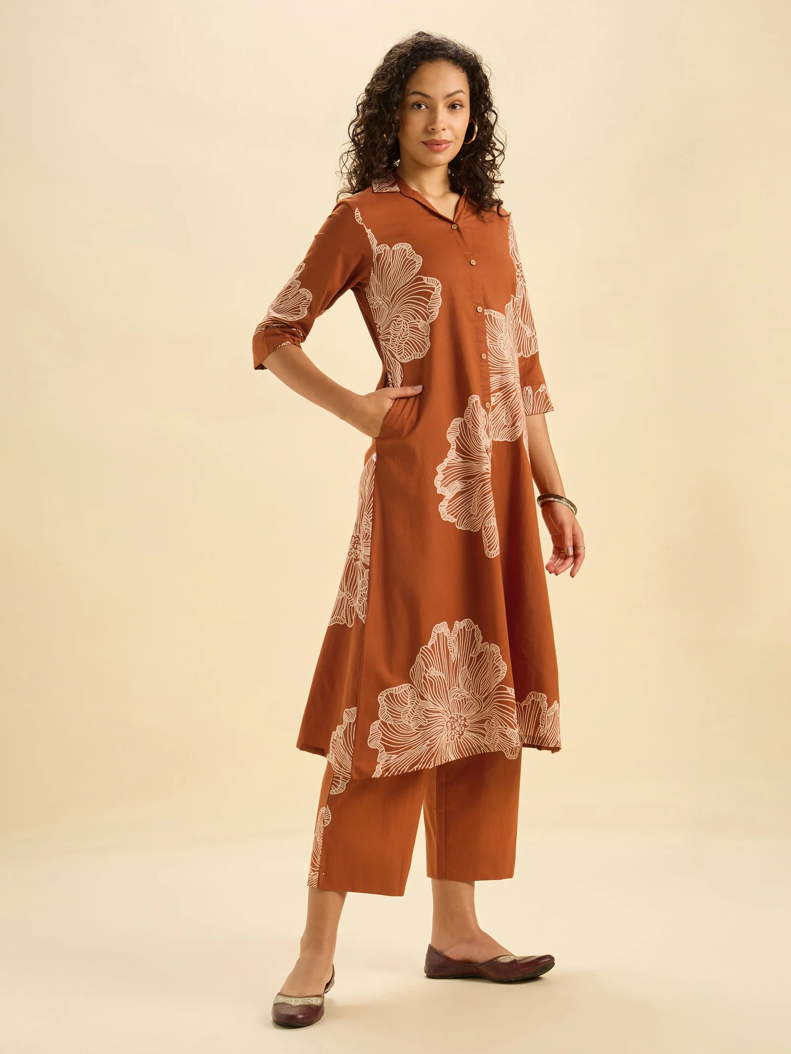 rust-orange-pure-cotton-printed-flared-kurti-set-6